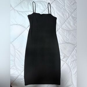 Spaghetti strap form fitting dress, below the knees. Size small.